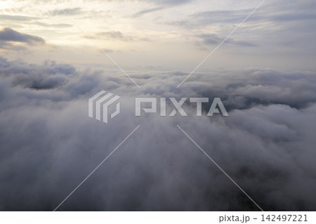 Landscape of Morning Mist with Mountain Layer. mountain ridge and clouds in rural jungle bush forest 142497221