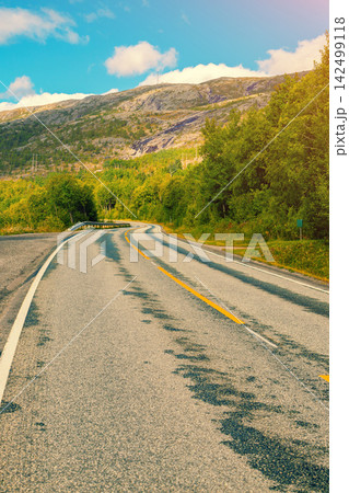 Driving a car on a mountain road. Nature Norway Driving a car on a mountain road. Nature Norway 142499118
