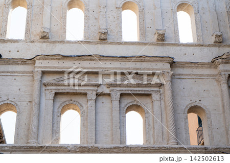 Historic Ancient Roman Porta Borsari Gate with Stone Arches and Columns on a Street in Verona, Italy 142502613