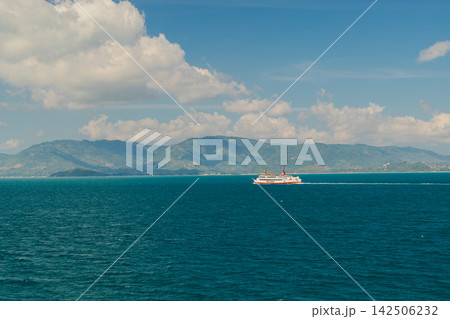 Passenger Ferry Crossing Before Mountainous Coastline Passenger Ferry Crossing Before Mountainous Coastline 142506232