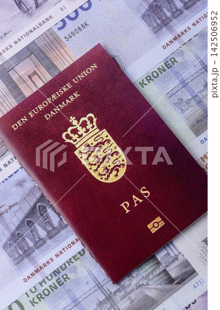 Denmark, Danish passport or id document with tickets for flight, travel. Danish passport 142506952