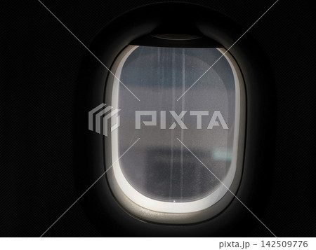 Window detail in Empty airplane cabin without passengers Window detail in Empty airplane cabin without passengers 142509776