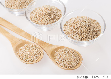 Quinoa grains in bowl isolated on white background, Chenopodium quinoa Quinoa grains in bowl isolated on white background, Chenopodium quinoa 142511403