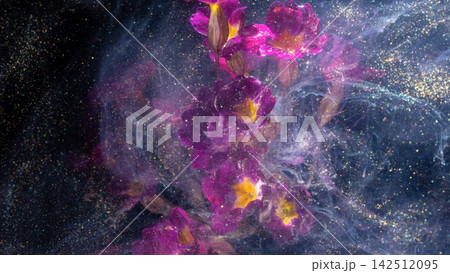 Pink and yellow orchid blossoms suspended in shimmering ink swirl with glittery particles Pink and yellow orchid blossoms suspended in shimmering ink swirl with glittery particles 142512095