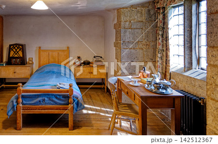 Vintage Historic Bedroom Interior with Single Oak Wooden Bed Vintage Historic Bedroom Interior with Single Oak Wooden Bed 142512367