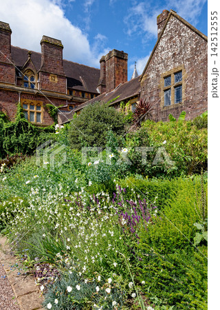 National Trust Knightshayes Court Gothic Revival Facade and Summer Garden Bloom 142512555