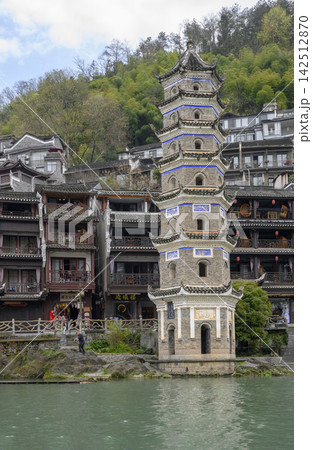 Wanming medieval seven-tiered pagoda on the Tuojiang river in Fenghuang, China Wanming medieval seven-tiered pagoda on the Tuojiang river in Fenghuang, China 142512870