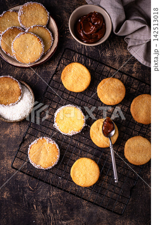 Alfajores, traditional Spanish sandwich cookies Alfajores, traditional Spanish sandwich cookies 142513018