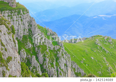 Mountain view overlooking valley and hills Mountain view overlooking valley and hills 142514089