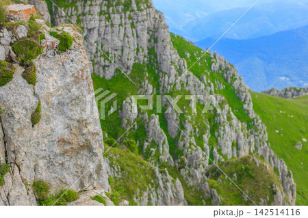 Mountain view overlooking valley and hills Mountain view overlooking valley and hills 142514116