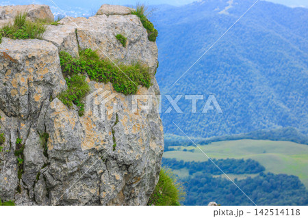 Mountain view overlooking valley and hills Mountain view overlooking valley and hills 142514118