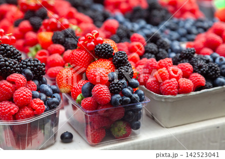 Fresh juicy berries at the market Fresh juicy berries at the market 142523041
