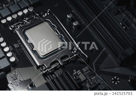 Electronic motherboard on B660 chipset with processor Intel LGA1700 close-up without logos Electronic motherboard on B660 chipset with processor Intel LGA1700 close-up without logos 142525701