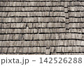 Weathered Wooden Shingle Roof with Traditional Rustic Wood Roofing Texture for Heritage Architecture and Interior Design 142526288