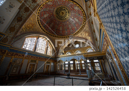 Istanbul,turkey,august 3, 2025. Grand imperial hall of topkapi harem in istanbul, ornate golden blue dome and intricate iznik tilework, historic ottoman grandeur 142526458