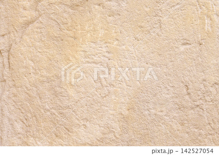 Beige weathered sandstone wall surface with natural rough grain texture and cracks. Abstract background of ancient stone architecture Beige weathered sandstone wall surface with natural rough grain texture and cracks. Abstract background of ancient stone architecture 142527054