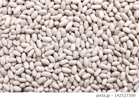 Dry white beans as a minimalist food texture with repeating organic shapes. Grocery products. Dry white beans as a minimalist food texture with repeating organic shapes. Grocery products. 142527300