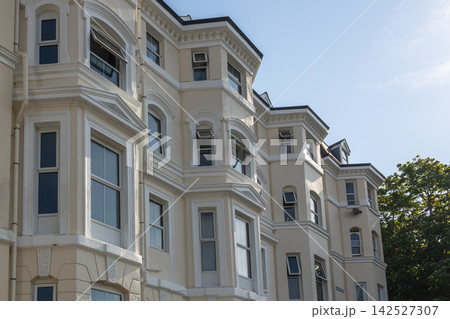 Traditional british residential townhouses facade Traditional british residential townhouses facade 142527307