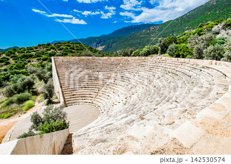 ancient amphitheater on the background of mountains ancient amphitheater on the background of mountains 142530574
