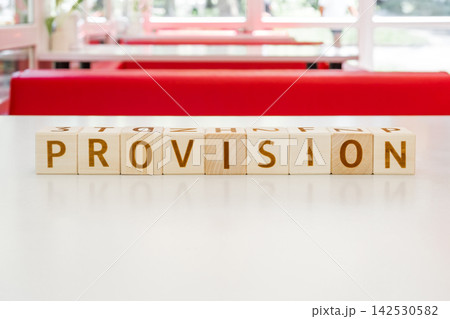 motivational word Provision is laid out from letters on wooden cubes motivational word Provision is laid out from letters on wooden cubes 142530582