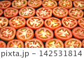 Full frame background of fresh ripe tomato slices laid out in seamless pattern, healthy organic food abstract texture 142531814