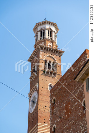 Torre dei Lamberti Medieval Clock Tower View against Blue Sky in Verona Old Town Center Veneto Italy 142533155