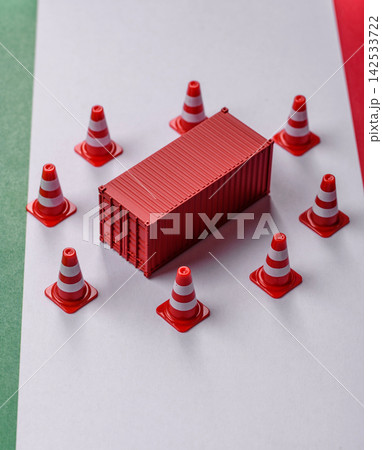 The cargo container ban on the Italian flag as a conceptual backdrop. Cargo container embargo The cargo container ban on the Italian flag as a conceptual backdrop. Cargo container embargo 142533722