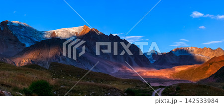 Tien Shan mountain's seasonal panoramic view at dramatic scenery Tien Shan mountain's seasonal panoramic view at dramatic scenery 142533984
