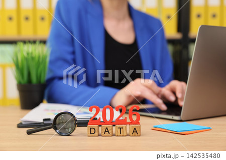 Working with data and planning for the future in a modern office setting Working with data and planning for the future in a modern office setting 142535480