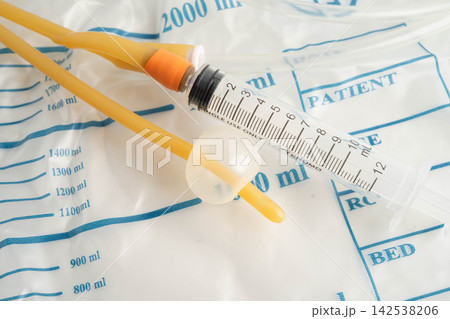 Foley catheter and urine drainage bag collect urine for disability or patient in hospital. 142538206