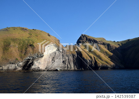 A beautiful seascape with steep hills in Labuan Bajo, Indonesia. A beautiful seascape with steep hills in Labuan Bajo, Indonesia. 142539387