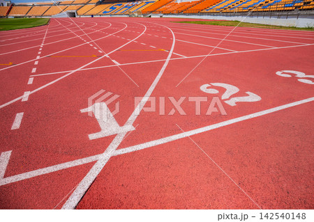 The running track in the stadium, marked with numbers, is beautifully colored. Copy space background The running track in the stadium, marked with numbers, is beautifully colored. Copy space background 142540148