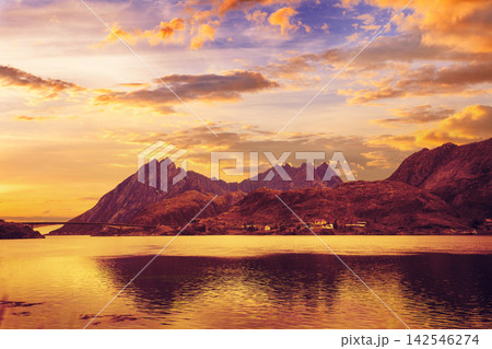 Mountains by the sea at sunset. The beautiful nature of Norway Mountains by the sea at sunset. The beautiful nature of Norway 142546274