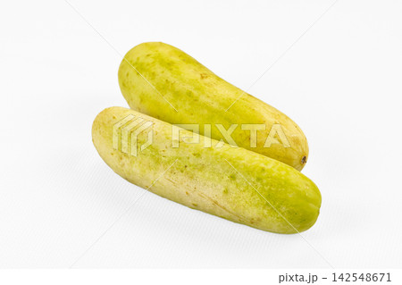 Two fresh green cucumbers on white background Two fresh green cucumbers on white background 142548671