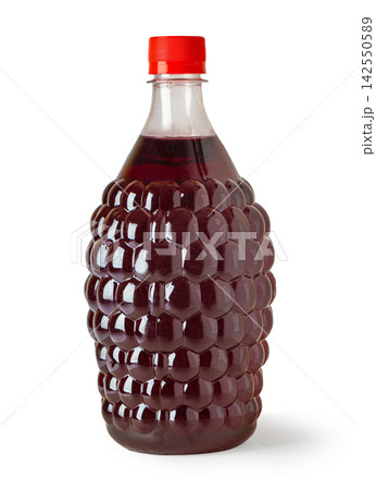 Blackberry shaped bottle containing dark berry juice Blackberry shaped bottle containing dark berry juice 142550589