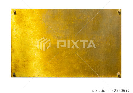 Blank aged brass metal plaque on wall 142550657