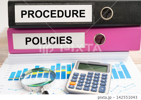 Pro, binder with graph and calculator at office. Pro, binder with graph and calculator at office. 142551043
