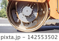 Close-Up View of Heavy Road Roller Metal Drum Wheel 142553502