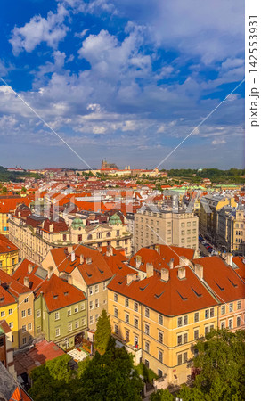Vibrant rooftops and clear skies over a city with historical buildings Vibrant rooftops and clear skies over a city with historical buildings 142553931
