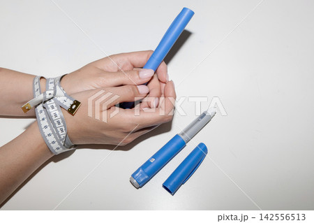 Ozempic and Weight Loss Treatment Concept Ozempic and Weight Loss Treatment Concept 142556513