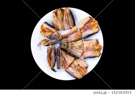 Top view of Crispy Deep-Fried Sun-Dried Catfish Served as Traditional Thai Dish 142563955