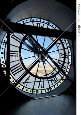 Iconic giant clock inside Musee d Orsay in Paris with Roman numerals and a view of the city through the transparent clock face Iconic giant clock inside Musee d Orsay in Paris with Roman numerals and a view of the city through the transparent clock face 142566993