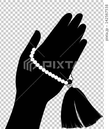 一隻女人的手拿著念珠的剪影 一隻女人的手拿著念珠的剪影 142567538