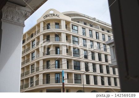Casablanca Art Deco building on Central Avenue framed by urban architecture, Morocco travel photo Casablanca Art Deco building on Central Avenue framed by urban architecture, Morocco travel photo 142569189