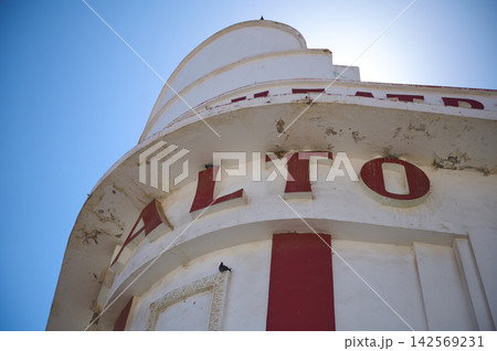 Curved art-deco building facade with red letters in Casablanca, Morocco Curved art-deco building facade with red letters in Casablanca, Morocco 142569231