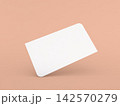 Blank card leaning on a surface in a simple setting 142570279