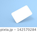 Blank white card on a light blue background at a slight angle showing a clean surface for creativity 142570284