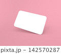 Card placed on a pink background with no text for design purposes 142570287