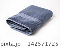 Folded bath towel isolated on white background 142571725