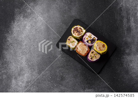 Turkish delight or lokum is a traditional Eastern sweet made with nuts. Turkish delight, lokum 142574585